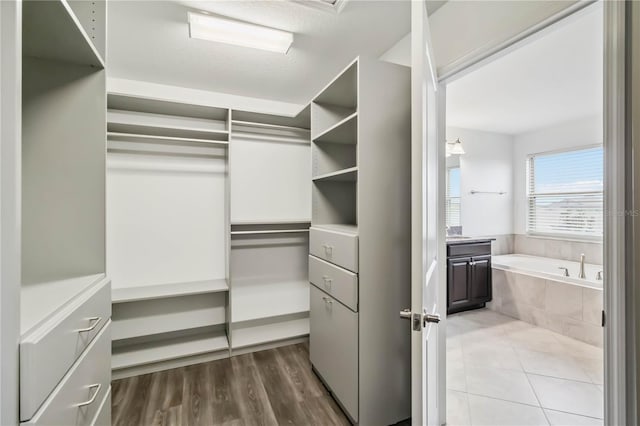 9629 Ivory Dr, Ruskin, FL 33573 - spacious closet with tile patterned floors