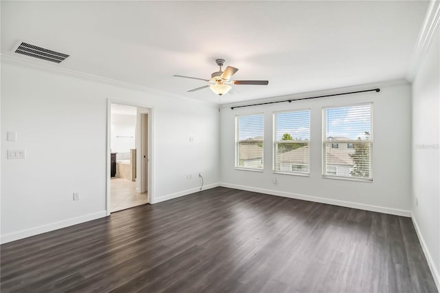 9629 Ivory Dr, Ruskin, FL 33573 - spare room featuring crown molding, a ceiling fan, and dark wood-style flooring