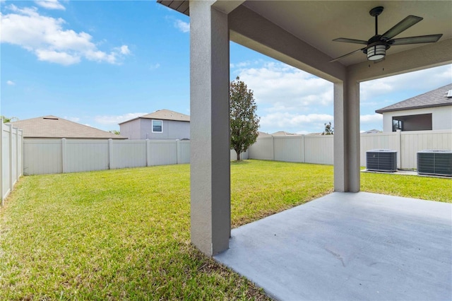 9629 Ivory Dr, Ruskin, FL 33573 - fenced backyard featuring a ceiling fan and a patio