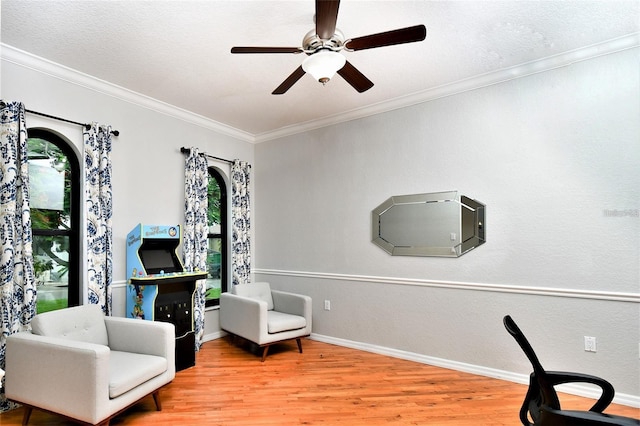 355 Trieste Dr, Punta Gorda, FL 33950 - sitting room featuring wood finished floors, ceiling fan, and crown molding