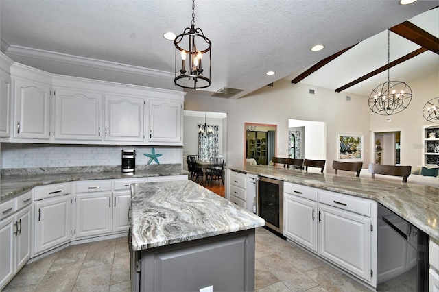 355 Trieste Dr, Punta Gorda, FL 33950 - kitchen featuring a chandelier, beverage cooler, tasteful backsplash, a kitchen island, and recessed lighting