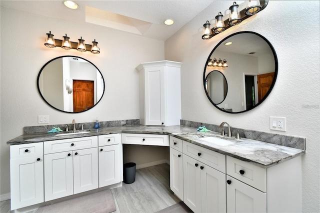 355 Trieste Dr, Punta Gorda, FL 33950 - bathroom with two vanities and recessed lighting