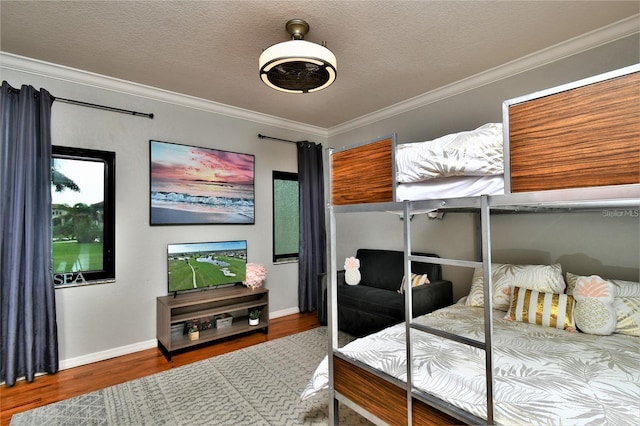 355 Trieste Dr, Punta Gorda, FL 33950 - bedroom with wood finished floors, crown molding, and a textured ceiling
