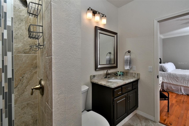 355 Trieste Dr, Punta Gorda, FL 33950 - ensuite bathroom with crown molding, vanity, a tile shower, and a textured wall