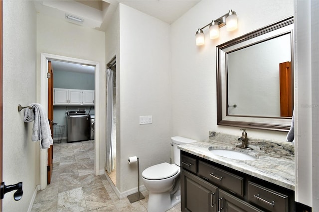 355 Trieste Dr, Punta Gorda, FL 33950 - full bathroom featuring washer and dryer, vanity, and a shower with curtain