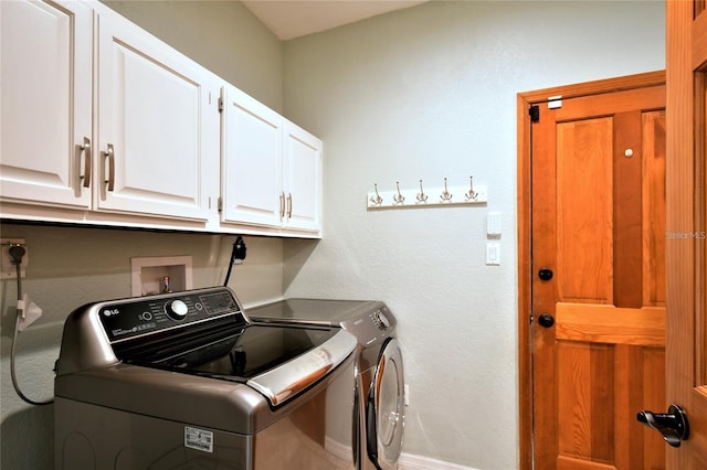 355 Trieste Dr, Punta Gorda, FL 33950 - laundry area with cabinet space and washing machine and dryer