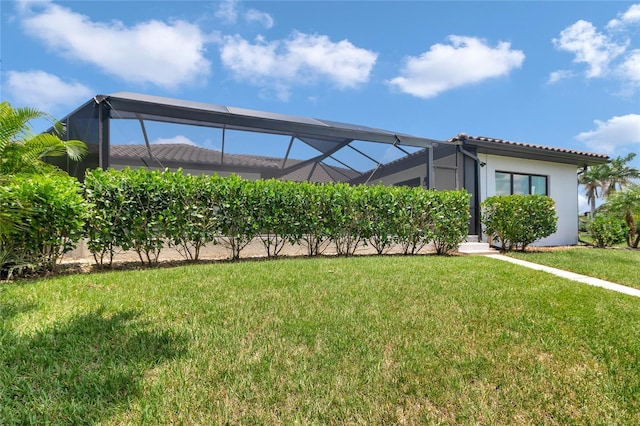 355 Trieste Dr, Punta Gorda, FL 33950 - view of grassy yard featuring glass enclosure