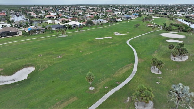 355 Trieste Dr, Punta Gorda, FL 33950 - aerial view of property and surrounding area with a nearby body of water, nearby suburban area, and a golf course