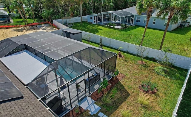 6 Pine Bluff Ln, Palm Coast, FL 32164 - view of swimming pool featuring glass enclosure and a fenced backyard