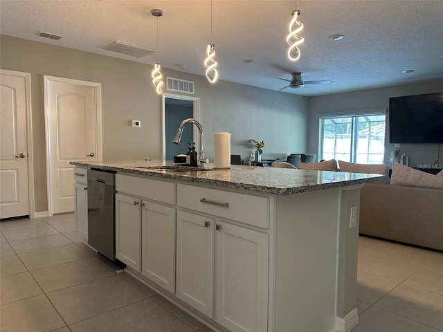 6 Pine Bluff Ln, Palm Coast, FL 32164 - kitchen with dishwasher, open floor plan, a textured ceiling, light tile patterned floors, and a ceiling fan