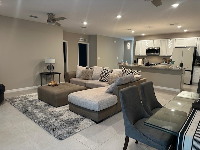 6 Pine Bluff Ln, Palm Coast, FL 32164 - living room featuring a ceiling fan, recessed lighting, and light tile patterned floors