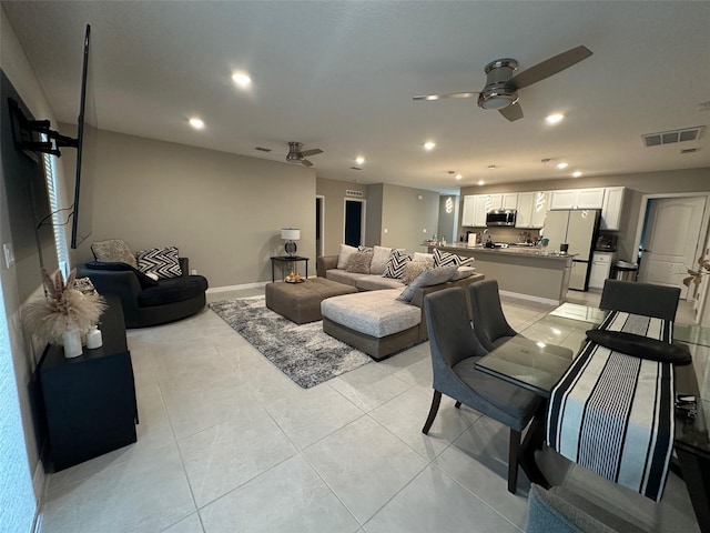 6 Pine Bluff Ln, Palm Coast, FL 32164 - living room with a ceiling fan, recessed lighting, and light tile patterned floors