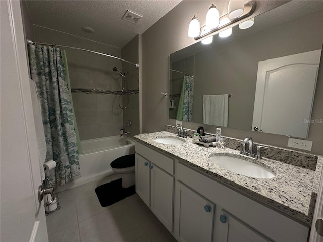 6 Pine Bluff Ln, Palm Coast, FL 32164 - bathroom with a textured ceiling, shower / bath combination with curtain, double vanity, and tile patterned flooring
