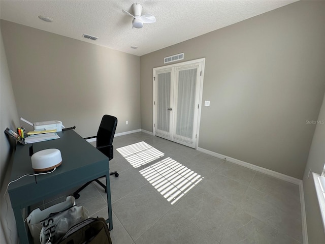 6 Pine Bluff Ln, Palm Coast, FL 32164 - office area featuring a textured ceiling and light tile patterned flooring