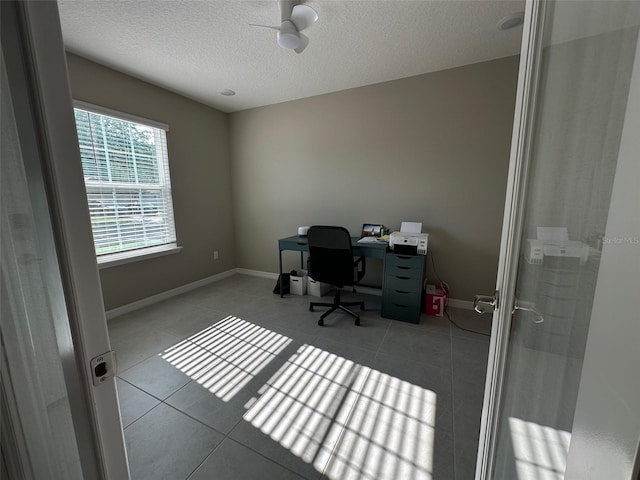 6 Pine Bluff Ln, Palm Coast, FL 32164 - tiled office space with a textured ceiling and baseboards