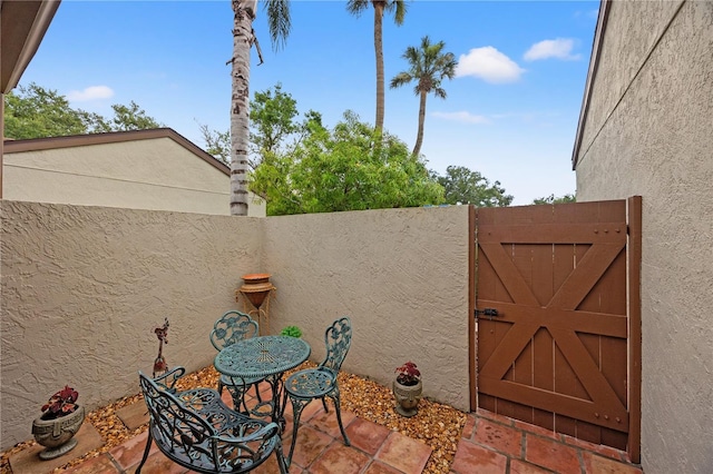 4509 Park Lake Ter N Unit 4509, Bradenton, FL 34209 - view of patio featuring a gate