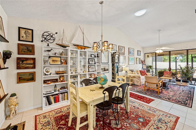 4509 Park Lake Ter N Unit 4509, Bradenton, FL 34209 - dining space featuring a chandelier, light tile patterned floors, vaulted ceiling, and a textured ceiling