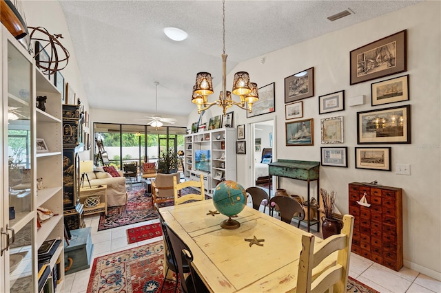 4509 Park Lake Ter N Unit 4509, Bradenton, FL 34209 - dining room with a textured ceiling, light tile patterned floors, a chandelier, ceiling fan, and lofted ceiling
