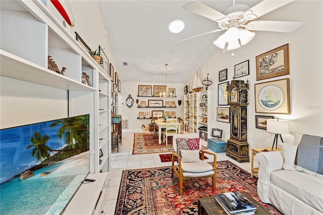 4509 Park Lake Ter N Unit 4509, Bradenton, FL 34209 - living area featuring a chandelier, light tile patterned flooring, lofted ceiling, and a ceiling fan