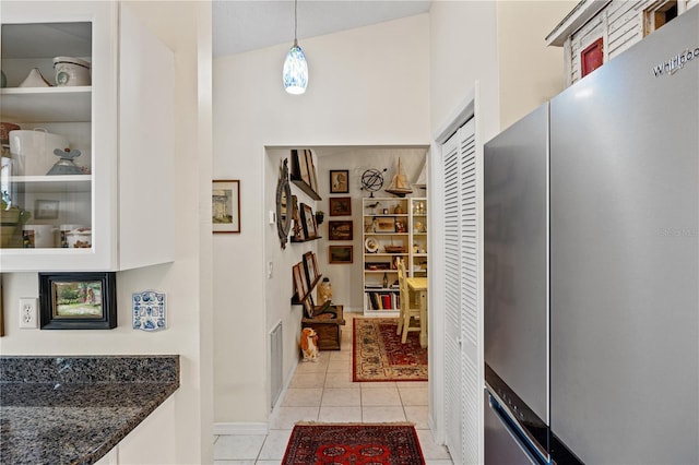 4509 Park Lake Ter N Unit 4509, Bradenton, FL 34209 - hall with light tile patterned flooring and a high ceiling