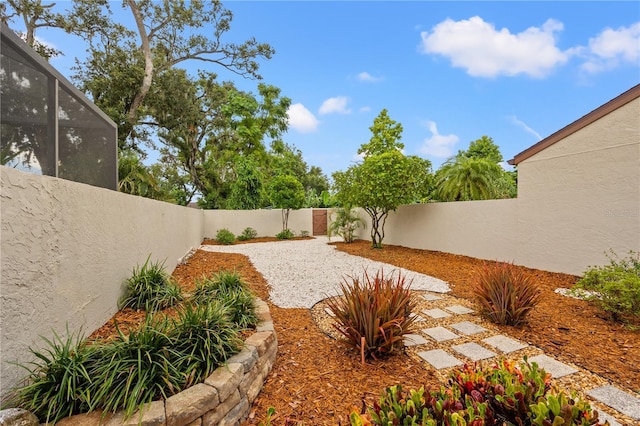 4509 Park Lake Ter N Unit 4509, Bradenton, FL 34209 - fenced backyard featuring glass enclosure