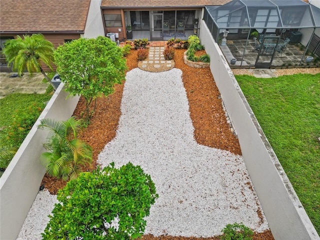4509 Park Lake Ter N Unit 4509, Bradenton, FL 34209 - view of green lawn with a patio and glass enclosure