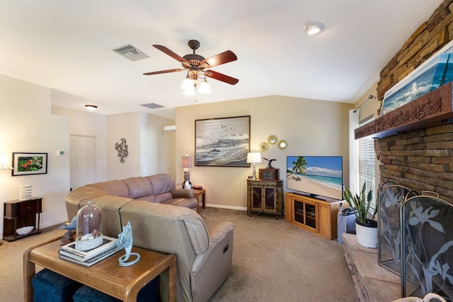 6115 68th Dr E, Palmetto, FL 34221 - living area featuring carpet, a ceiling fan, lofted ceiling, and a fireplace