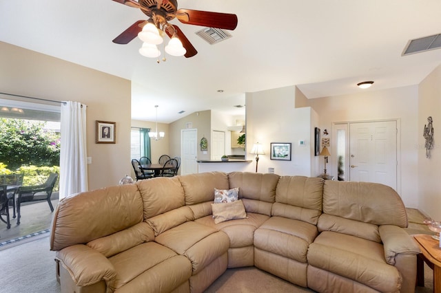 6115 68th Dr E, Palmetto, FL 34221 - carpeted living room featuring a ceiling fan and lofted ceiling