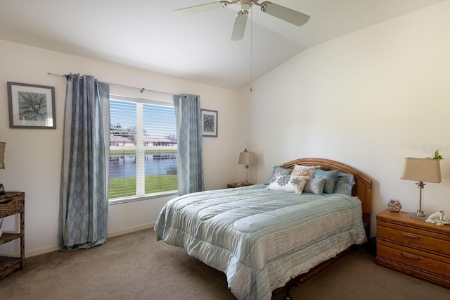 6115 68th Dr E, Palmetto, FL 34221 - bedroom with multiple windows, carpet floors, vaulted ceiling, a water view, and a ceiling fan