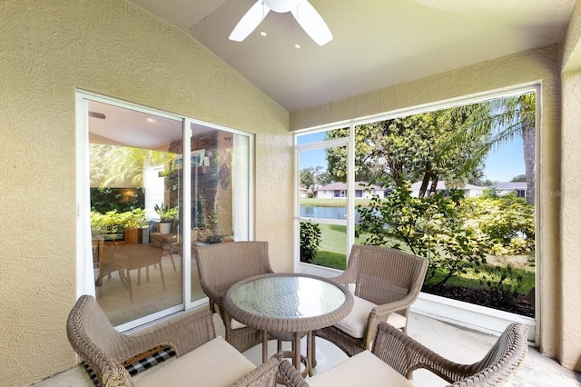 6115 68th Dr E, Palmetto, FL 34221 - sunroom with a textured wall, vaulted ceiling, ceiling fan, and a water view