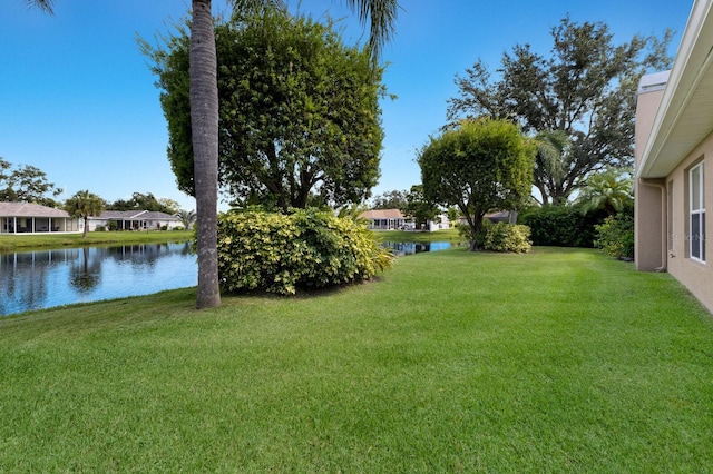 6115 68th Dr E, Palmetto, FL 34221 - view of green lawn featuring a water view and a residential view