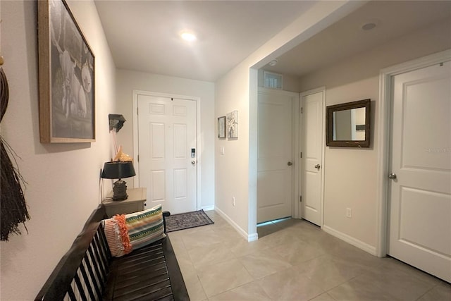 12293 Mountain Island Trl, Parrish, FL 34219 - entrance foyer with baseboards and light tile patterned floors
