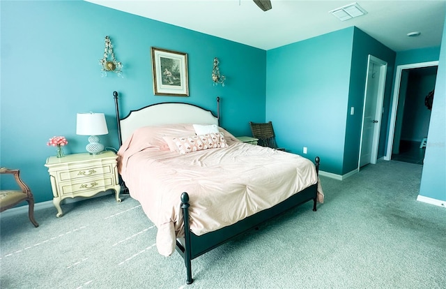 12293 Mountain Island Trl, Parrish, FL 34219 - carpeted bedroom with baseboards and ceiling fan