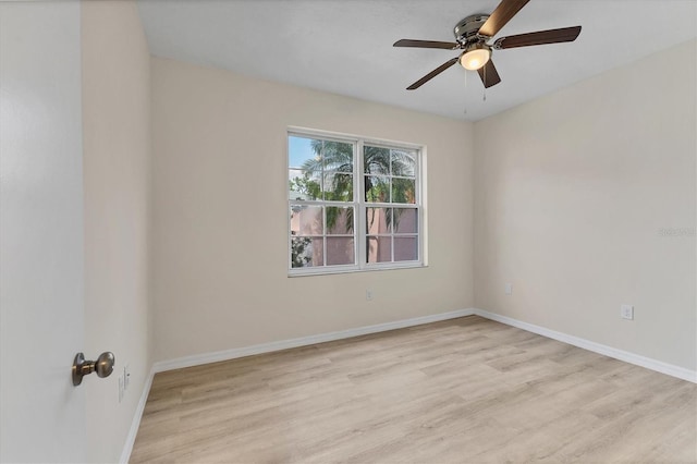 4050 Pinebrook Cir Unit 5, Bradenton, FL 34209 - unfurnished room featuring wood finished floors and ceiling fan