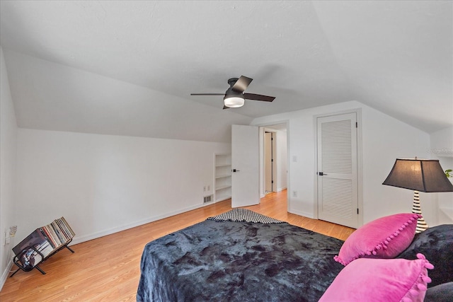626 Hand Ave, Sarasota, FL 34232 - bedroom featuring vaulted ceiling, wood finished floors, and ceiling fan