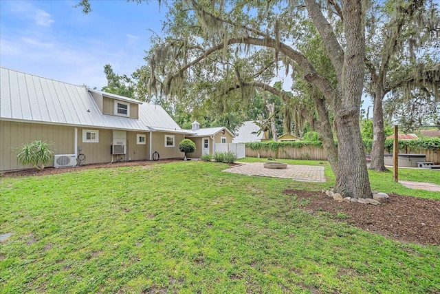 626 Hand Ave, Sarasota, FL 34232 - view of yard featuring a patio and an outdoor fire pit