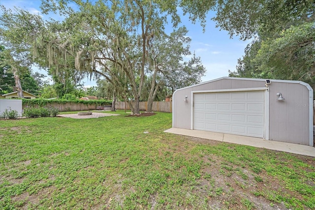 626 Hand Ave, Sarasota, FL 34232 - view of yard with a garage, an outbuilding, and driveway