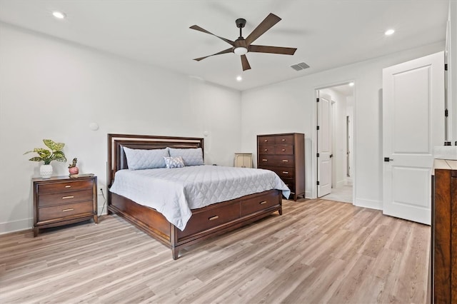 5318 124th Ave E, Parrish, FL 34219 - bedroom featuring light wood finished floors, recessed lighting, a ceiling fan, and ensuite bath