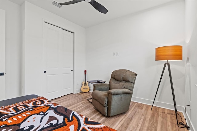 5318 124th Ave E, Parrish, FL 34219 - bedroom with light wood-type flooring, a closet, and a ceiling fan