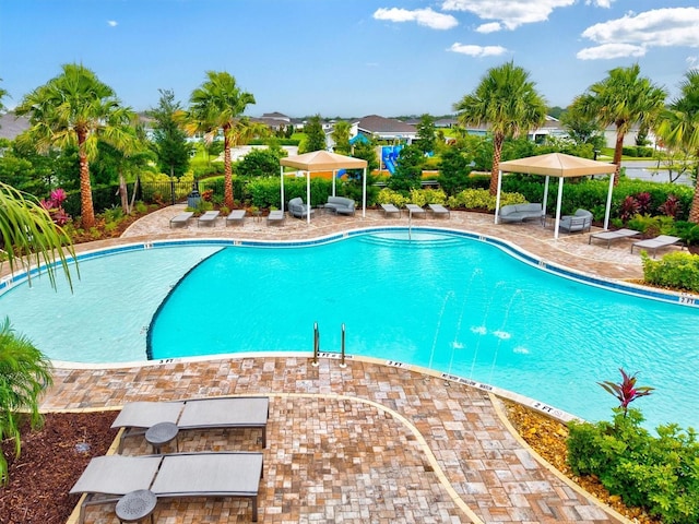 5318 124th Ave E, Parrish, FL 34219 - community pool featuring a patio area