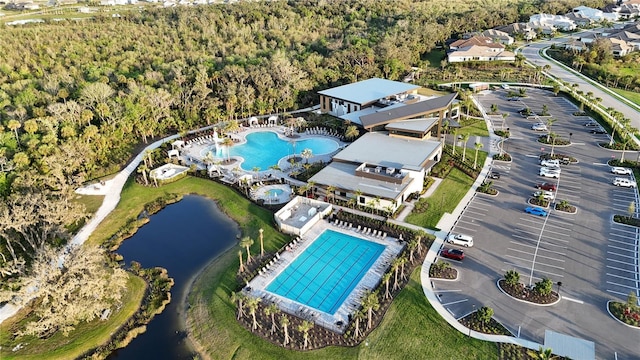 9084 Tequila Sunrise Dr, Sarasota, FL 34241 - bird's eye view of a pool and a large body of water