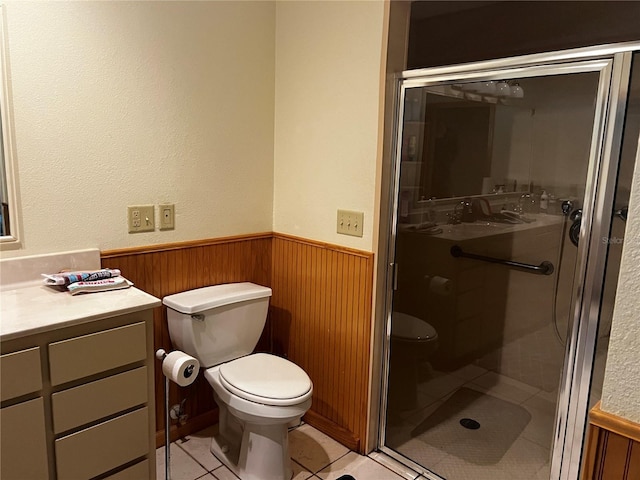 2065 Flamingo Dr, Bartow, FL 33830 - full bath featuring a wainscoted wall, a stall shower, tile patterned flooring, wooden walls, and vanity