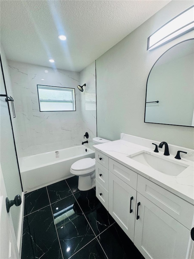 7013 Symmes Rd, Gibsonton, FL 33534 - bathroom featuring vanity, a textured ceiling, shower / washtub combination, marble look tiles, and recessed lighting