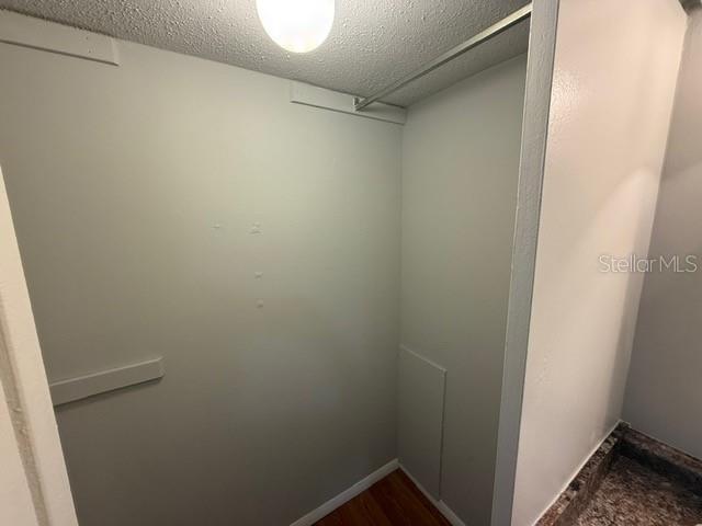 2763 Woodgate Ln Unit 111, Sarasota, FL 34231 - view of walk in closet