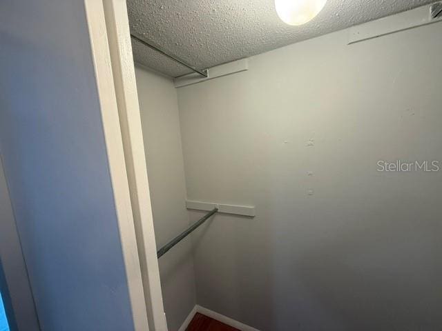 2763 Woodgate Ln Unit 111, Sarasota, FL 34231 - view of walk in closet