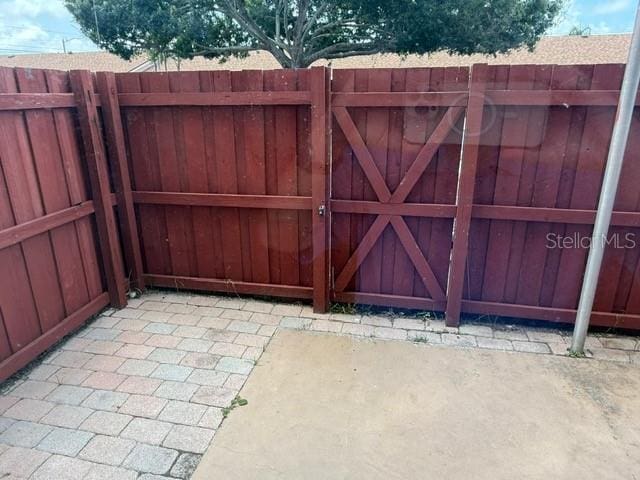 2763 Woodgate Ln Unit 111, Sarasota, FL 34231 - view of gate