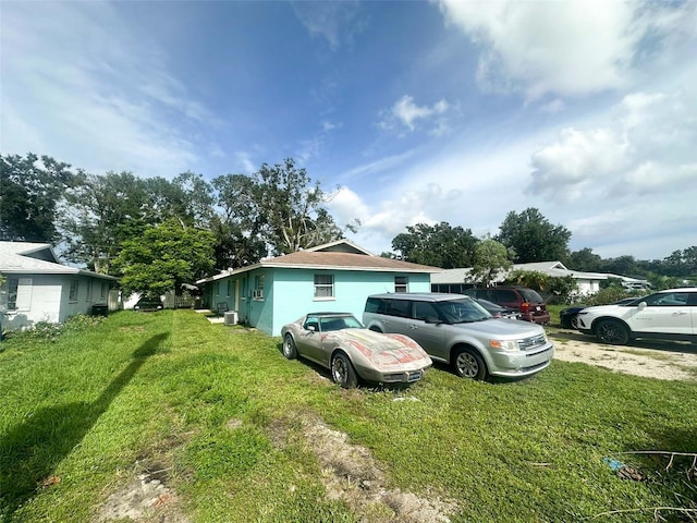 4007 7th St E, Bradenton, FL 34208 - view of side of home with a yard