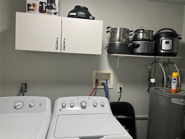 4007 7th St E, Bradenton, FL 34208 - washroom with cabinet space, separate washer and dryer, and water heater