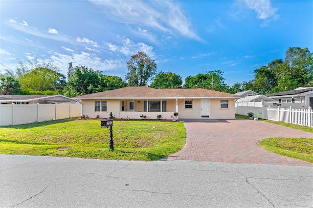 2108 Outer Dr, Sarasota, FL 34231 - ranch-style home with decorative driveway and stucco siding