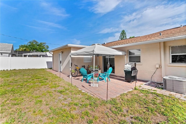 2108 Outer Dr, Sarasota, FL 34231 - rear view of house featuring a patio area and concrete block siding
